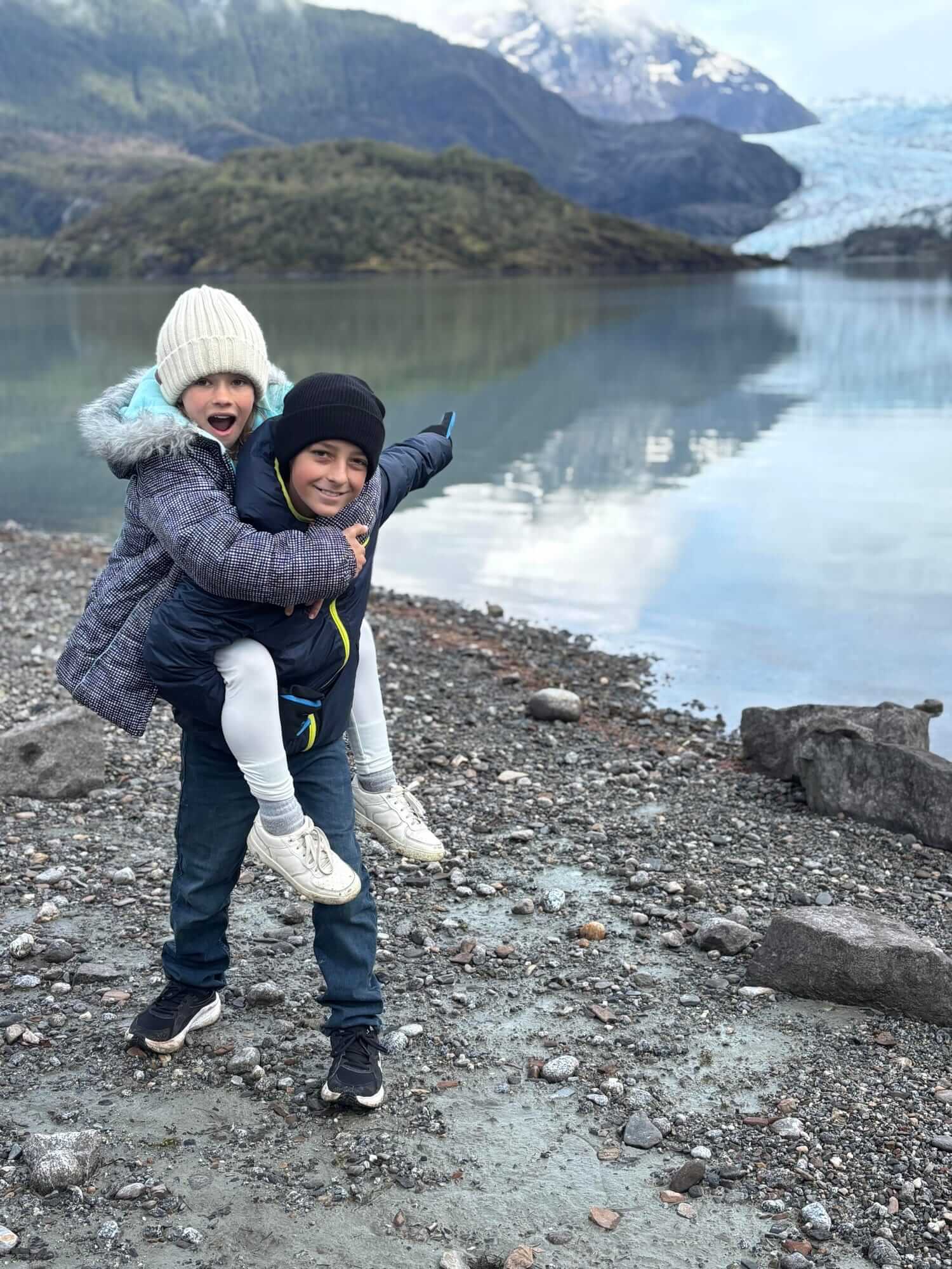Our kids on the shore of a glacier lake