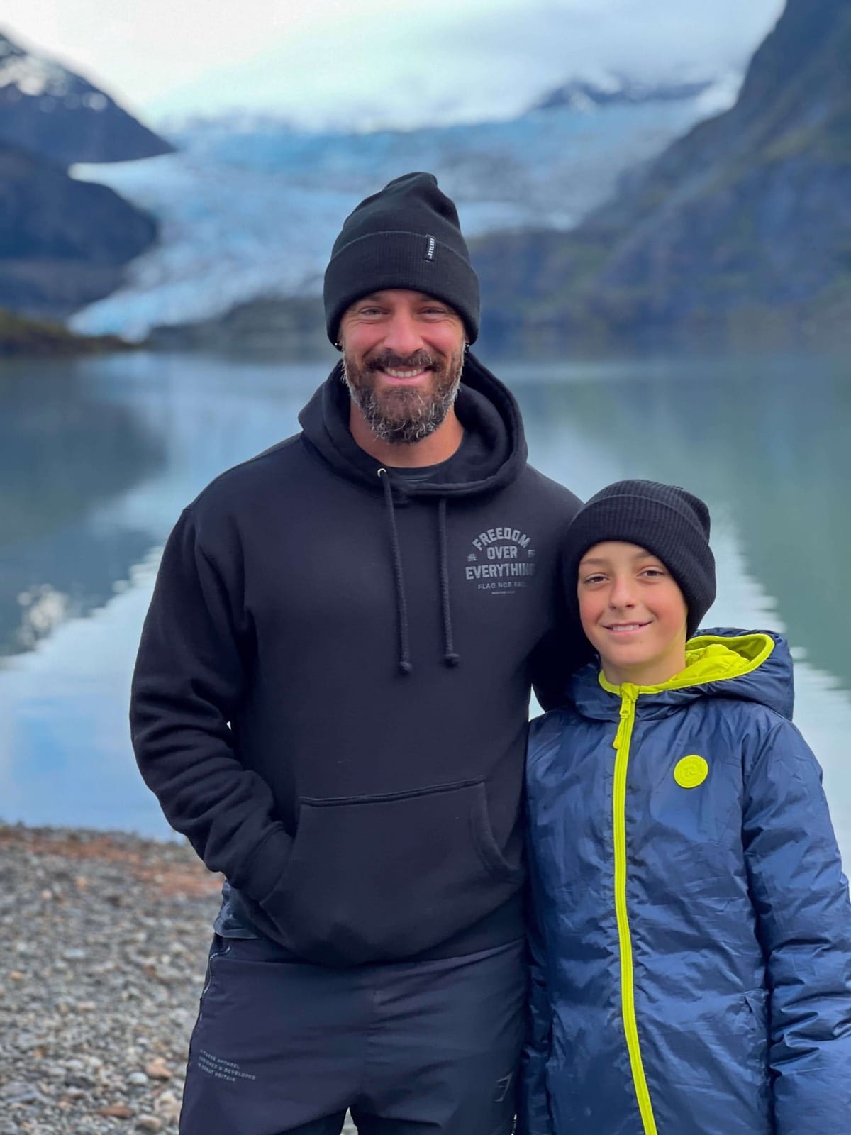 Todd Austin with his son Arie at a glacier lake